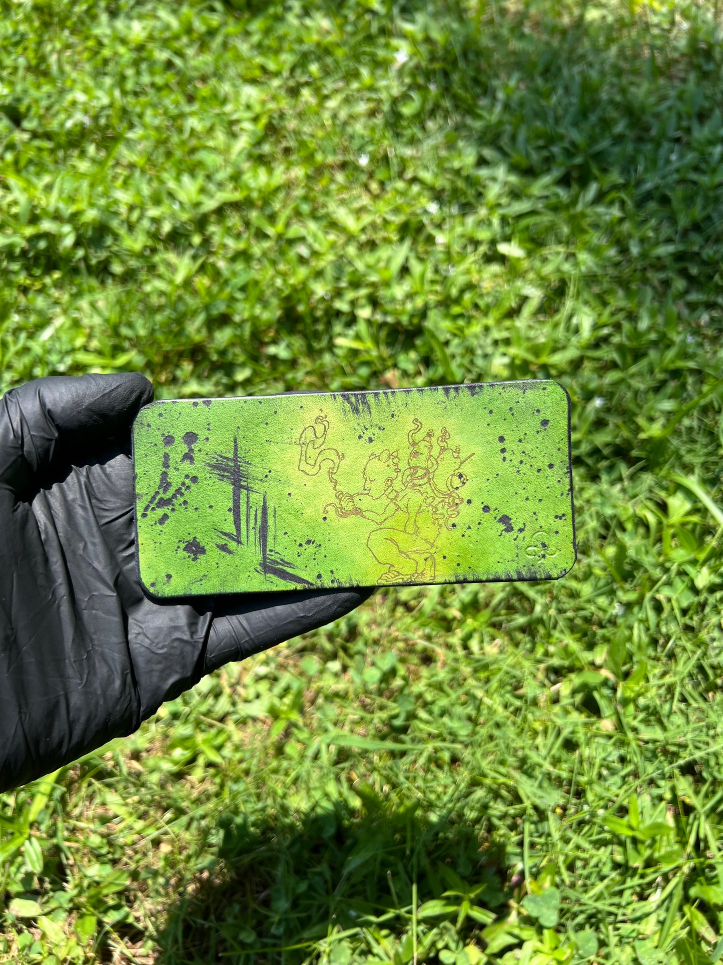 Small Engraved leather mat - green